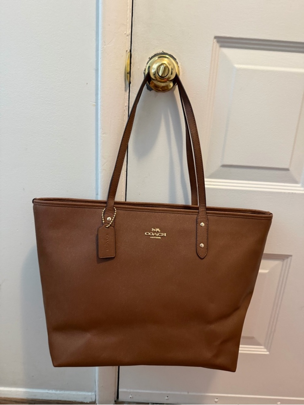 Coach City Zip Tote in the color Saddle Brown. - Picture 1 of 5